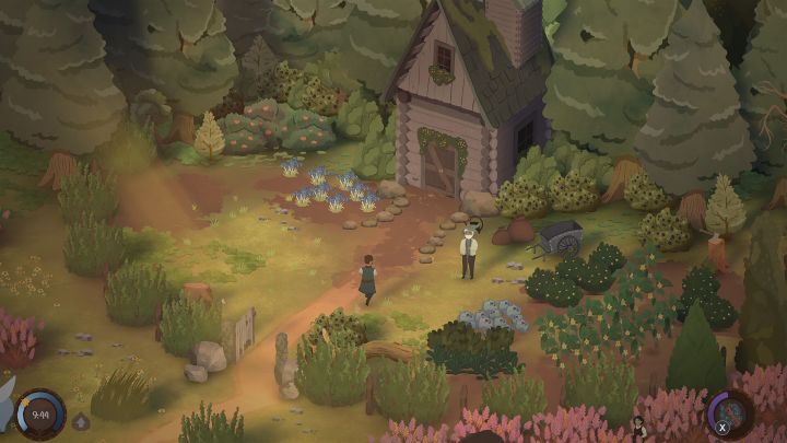 A sunlit garden and cottage surrounded by trees