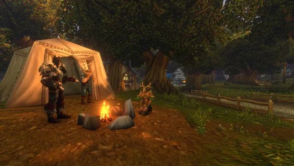 Players resting at a campfire in World of Warcraft: Forever