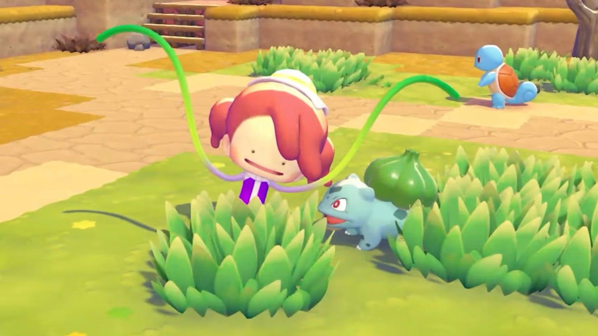 A happy Ditto shaped as a young girl wiggles her vine whip arms from behind a bright green patch of grass