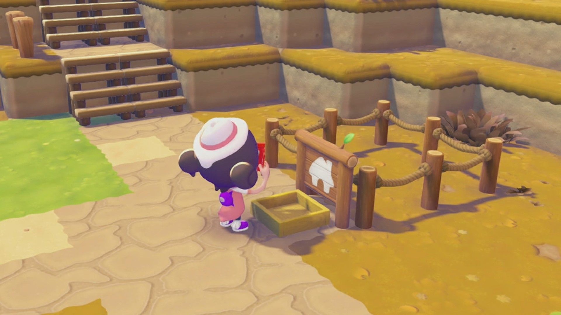 Pokopia player prepares to build a house in their town